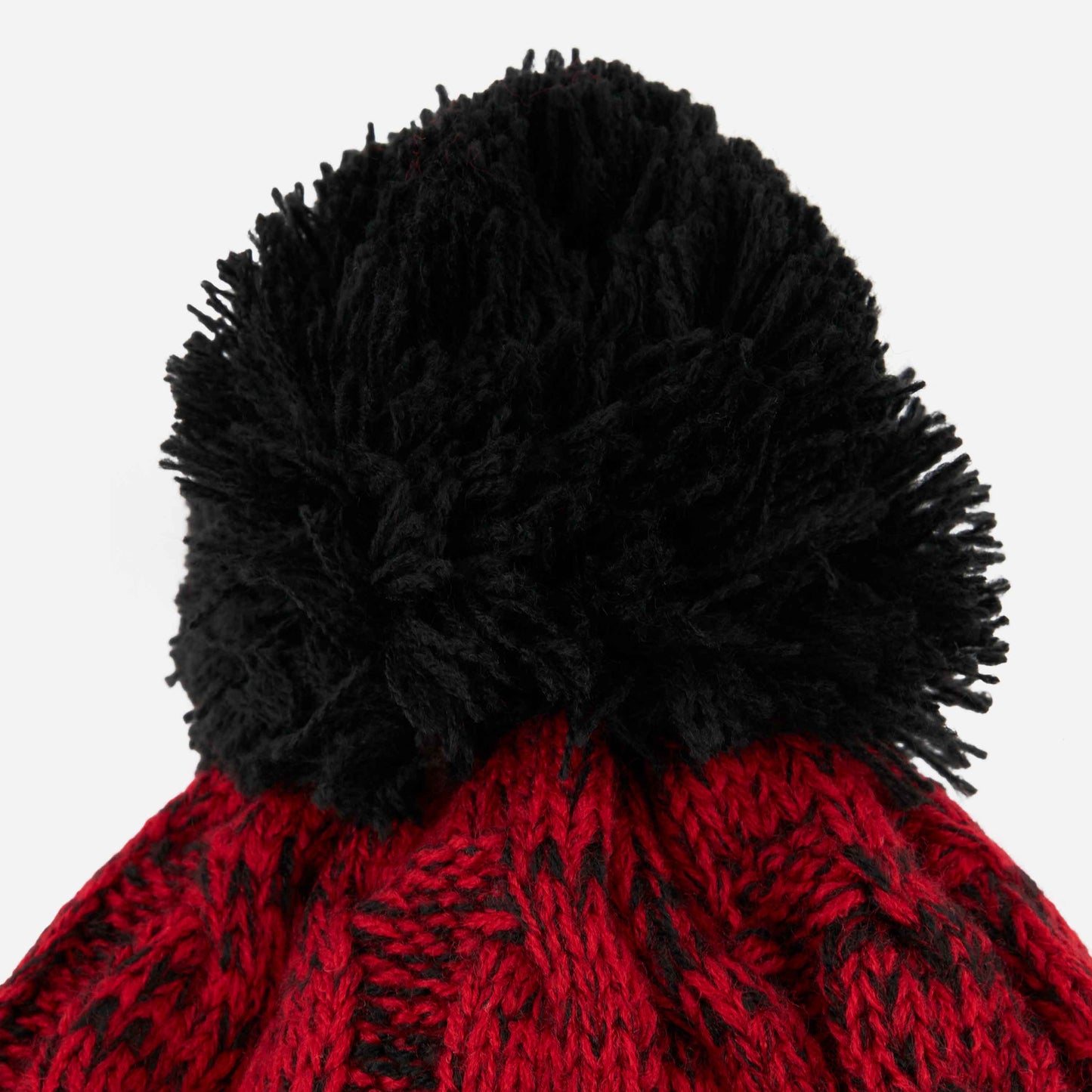 BERRETTO MILAN A TRECCE CON POMPON E PATCH LOGO