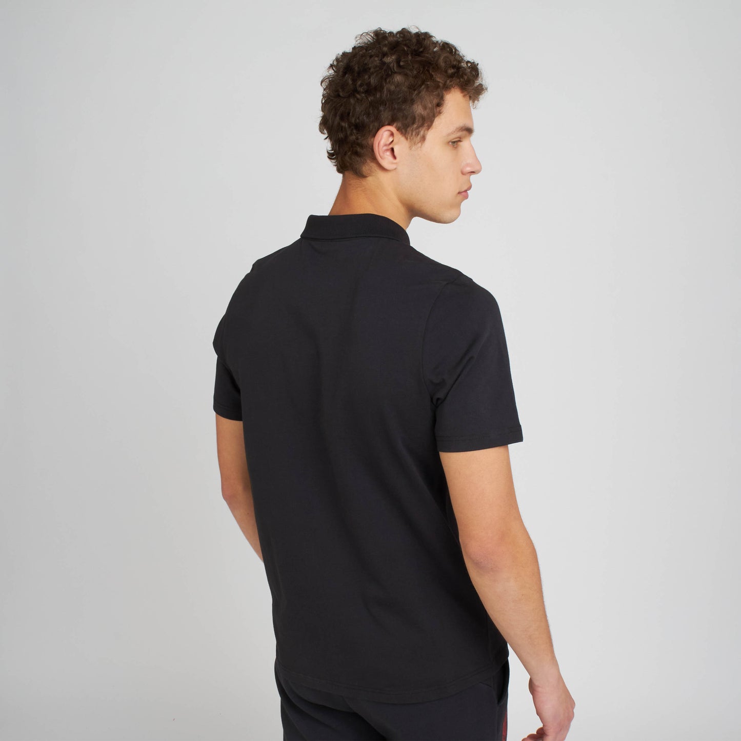 AC MILAN ESSENTIAL COLLECTION BLACK SHORT-SLEEVED POLO SHIRT