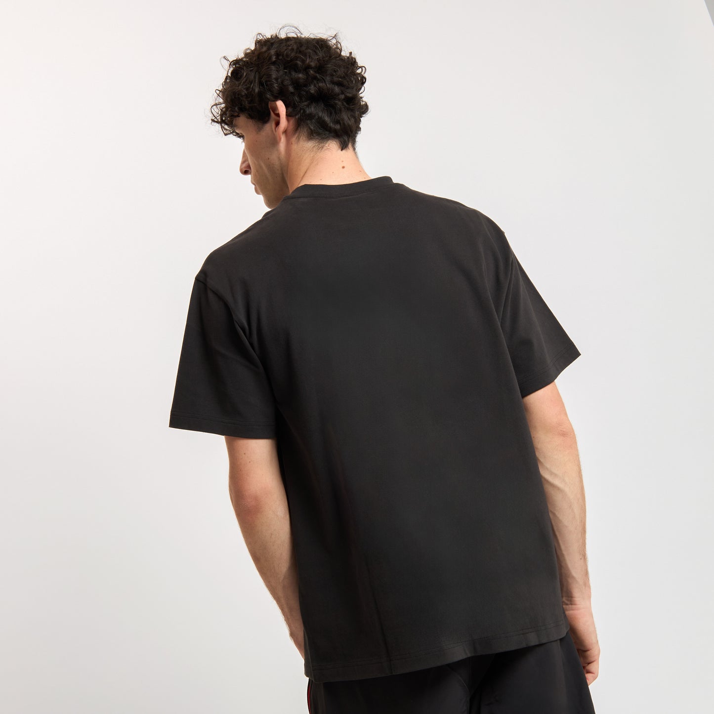 T-SHIRT NERA FOOTBALL STATEMENT MILAN